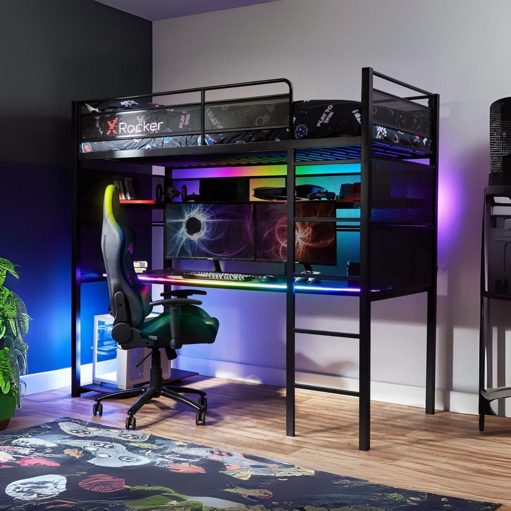 Gaming room setup with a high chair, desk, and computer setup.