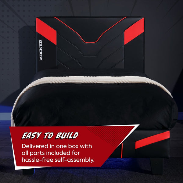 Black and red gaming bed with X rocker branding on a dark background