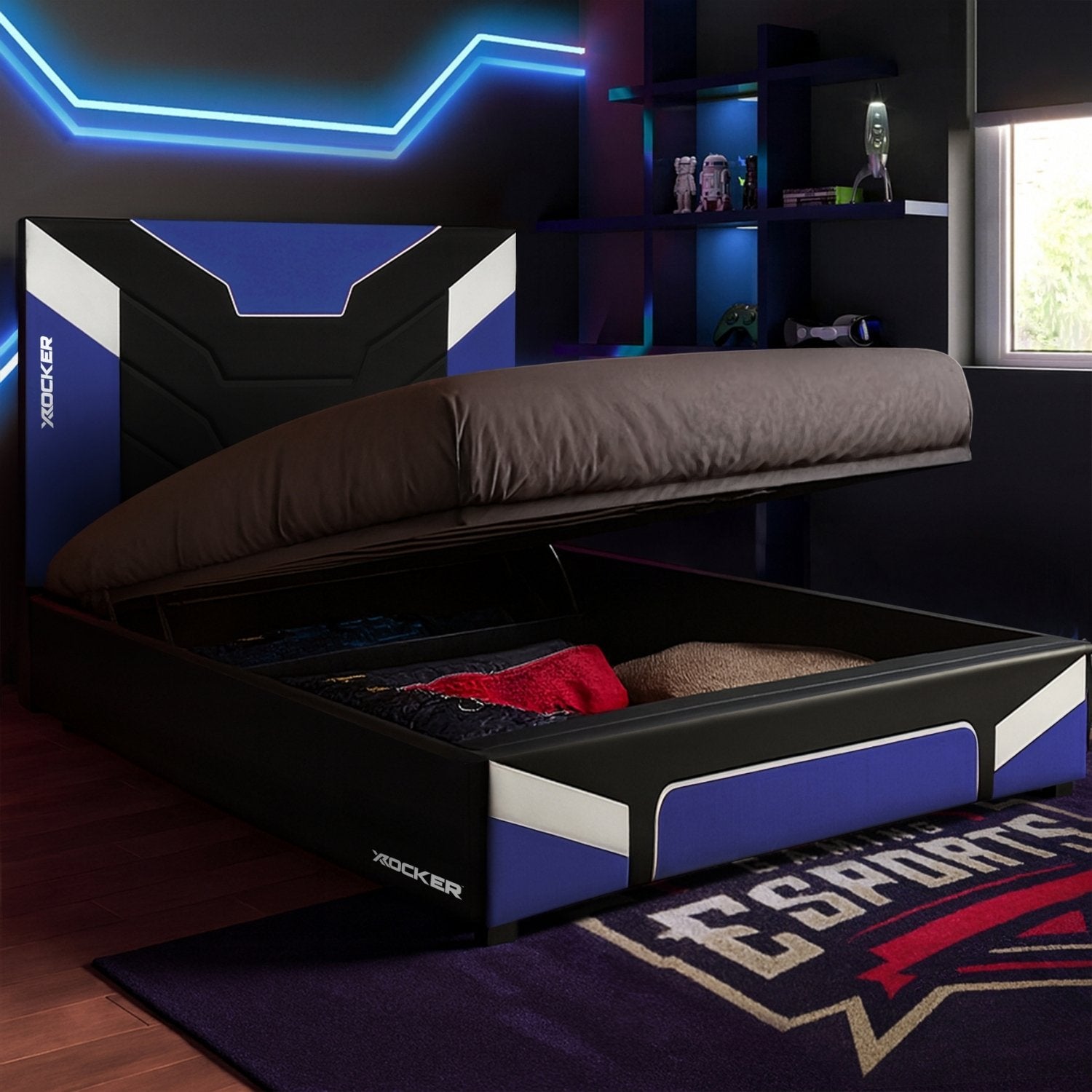 Bed with storage compartments in a room with gaming equipment and decor.