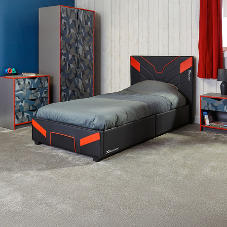 Modern bedroom with a black and red bed frame, matching nightstands, and camouflage-patterned headboard.