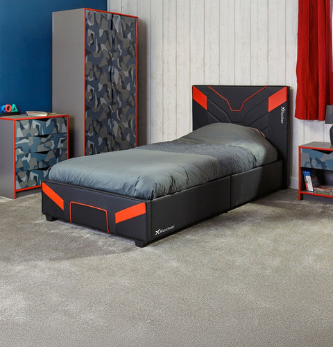 Modern bedroom with a black and red bed frame, matching nightstands, and camouflage-patterned headboard.