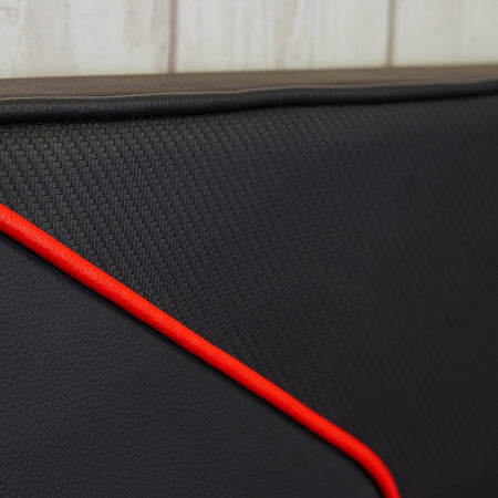 Close up of the x rocker cerberus MK11 Gaming Bed headboard in carbon red featuring a padded upholstered design for extra comfort.