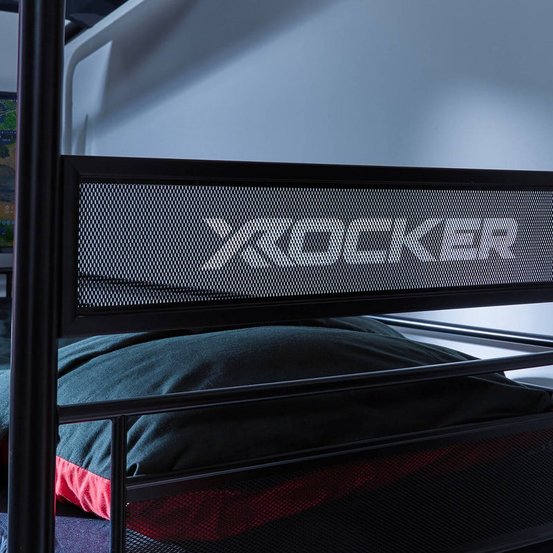 X rocker mid sleeper tv bed with branding on a black bed frame.