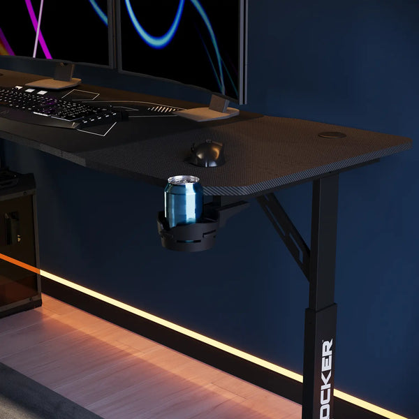 Cougar XL Gaming desk with computer setup and LED lighting on a dark blue wall.