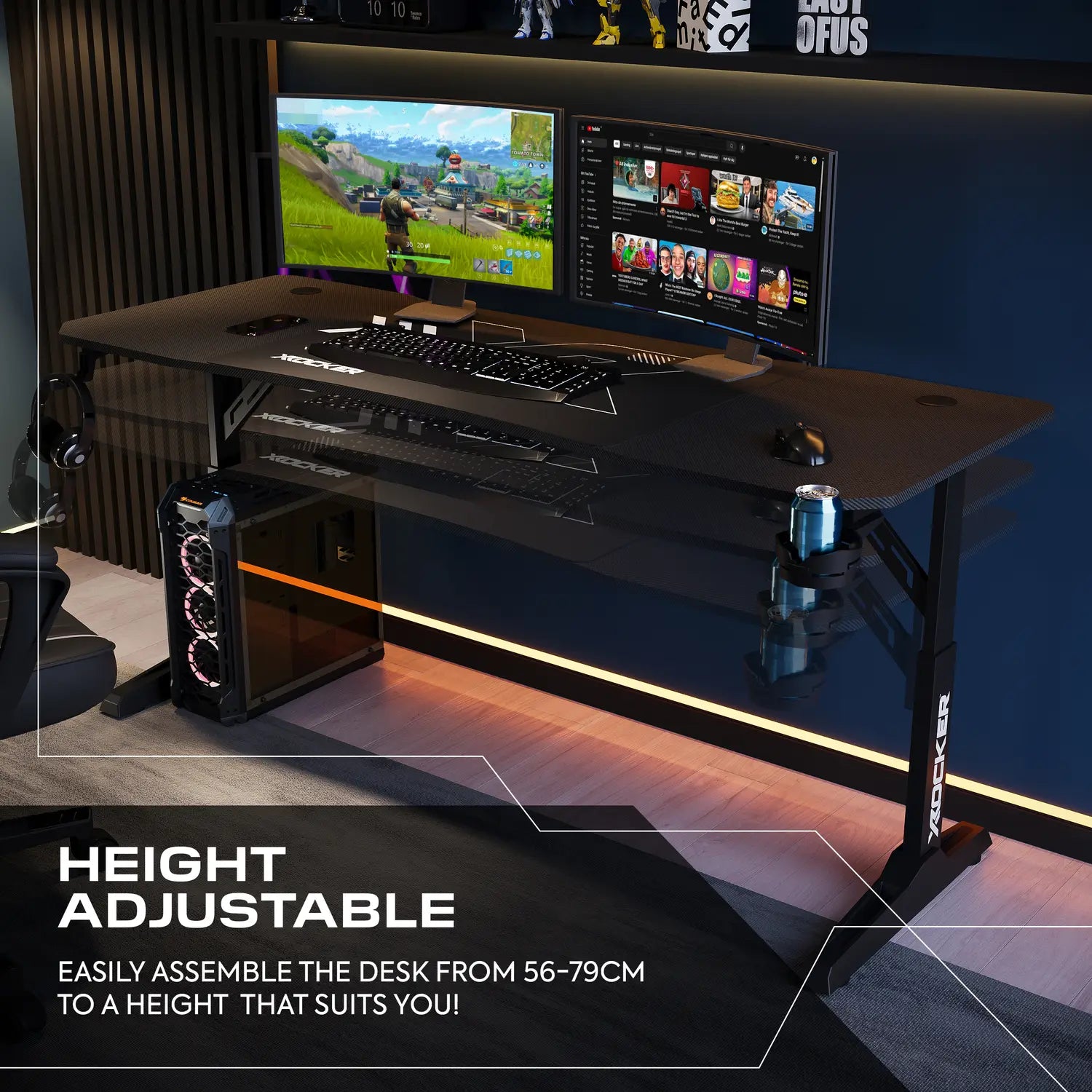 Cougar Gaming desk setup with two monitors, keyboard, and mouse on a dark-themed room.