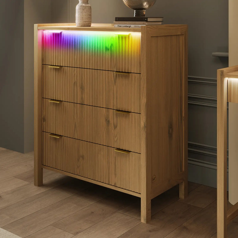 Wooden dresser with RGB lighting on a wooden floor.