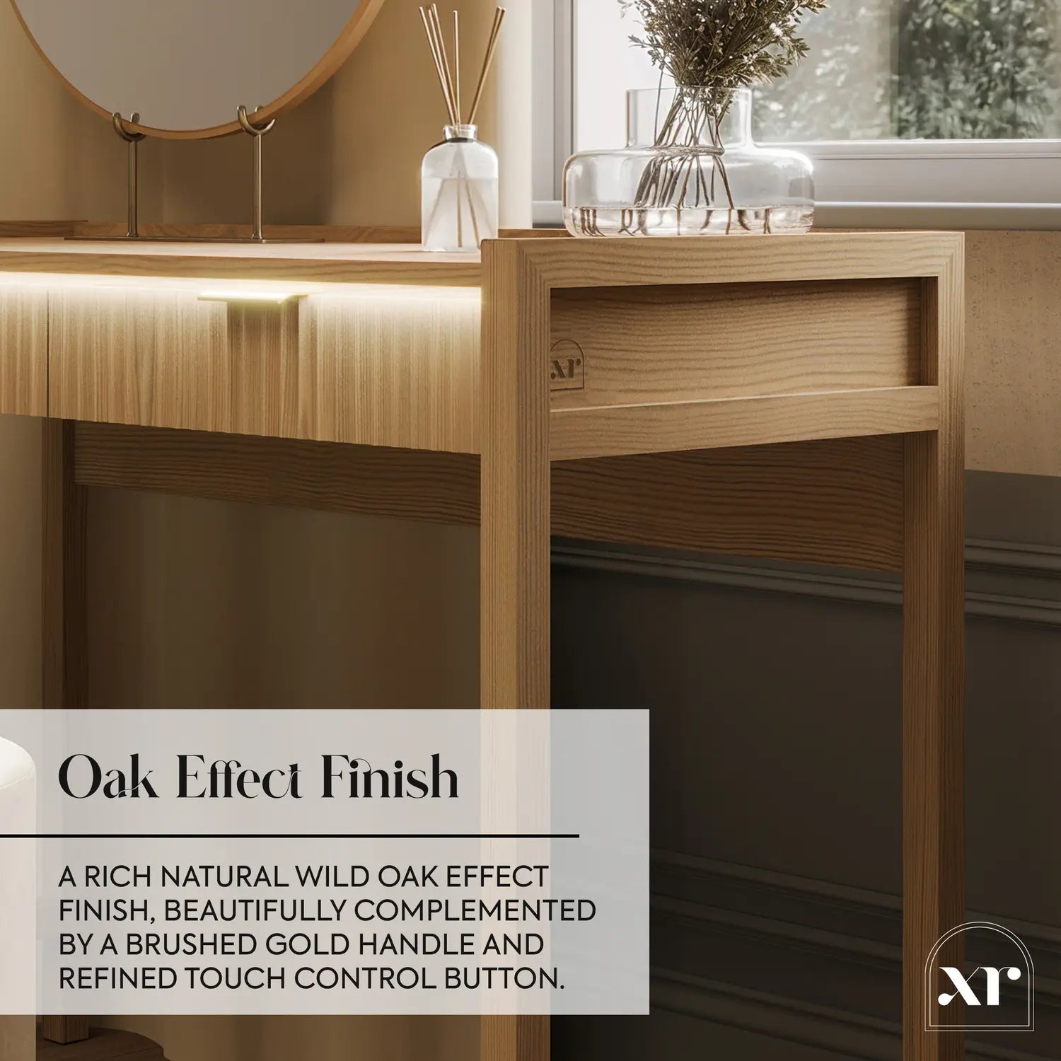 Wooden desk with a mirror, diffuser, and vase in a room with a window.