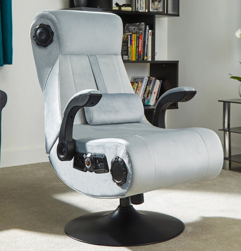 Gray gaming chair with control panels in a room setting