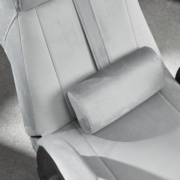 Gray office chair with a headrest in a minimalistic setting