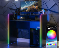 Gaming desk with RGB lighting, computer setup, and smartphone displaying lighting app.