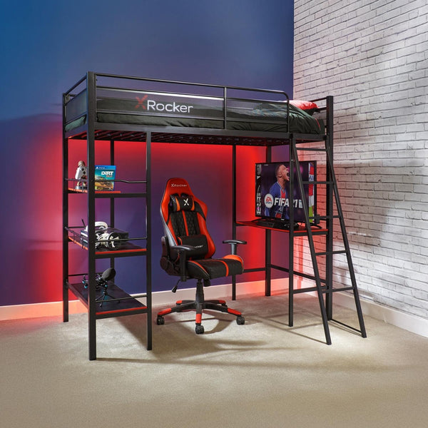 Gaming room setup with a loft bed, gaming chair, and TV.