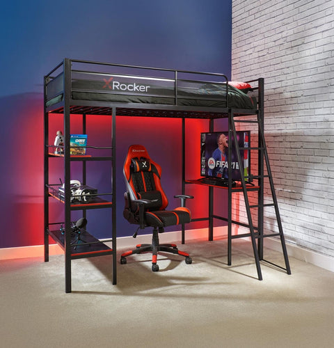 Gaming room setup with a loft bed, gaming chair, and TV.