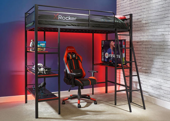 Gaming room setup with a loft bed, gaming chair, and TV.