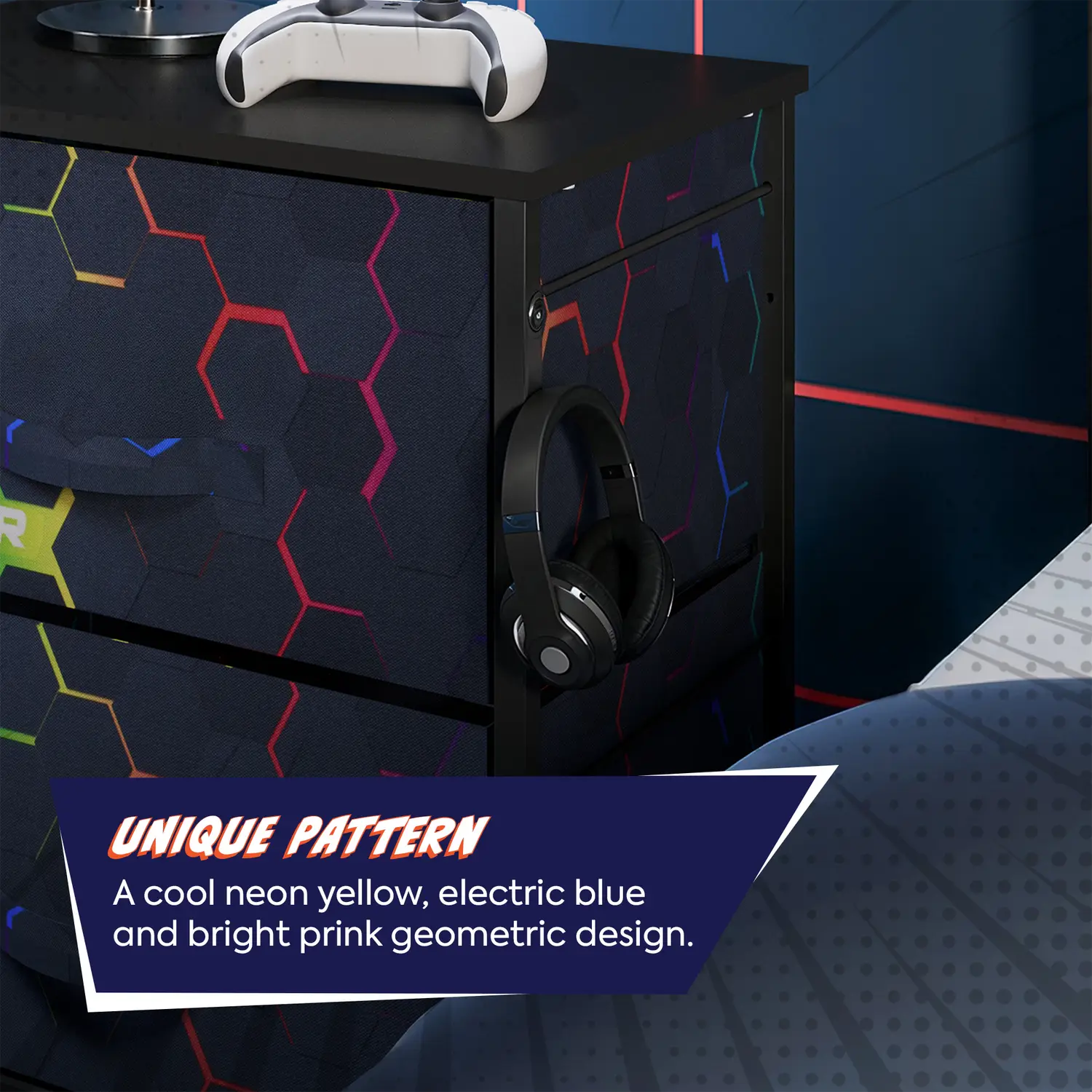 Black tallboy dresser with colorful geometric pattern and gaming accessories on a blue background