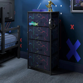 Black dresser with colorful geometric patterns in a bedroom setting.