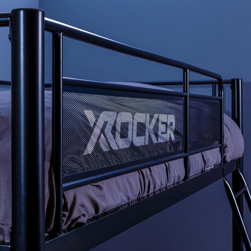 Black metal bed frame with X rocker logo against a blue background