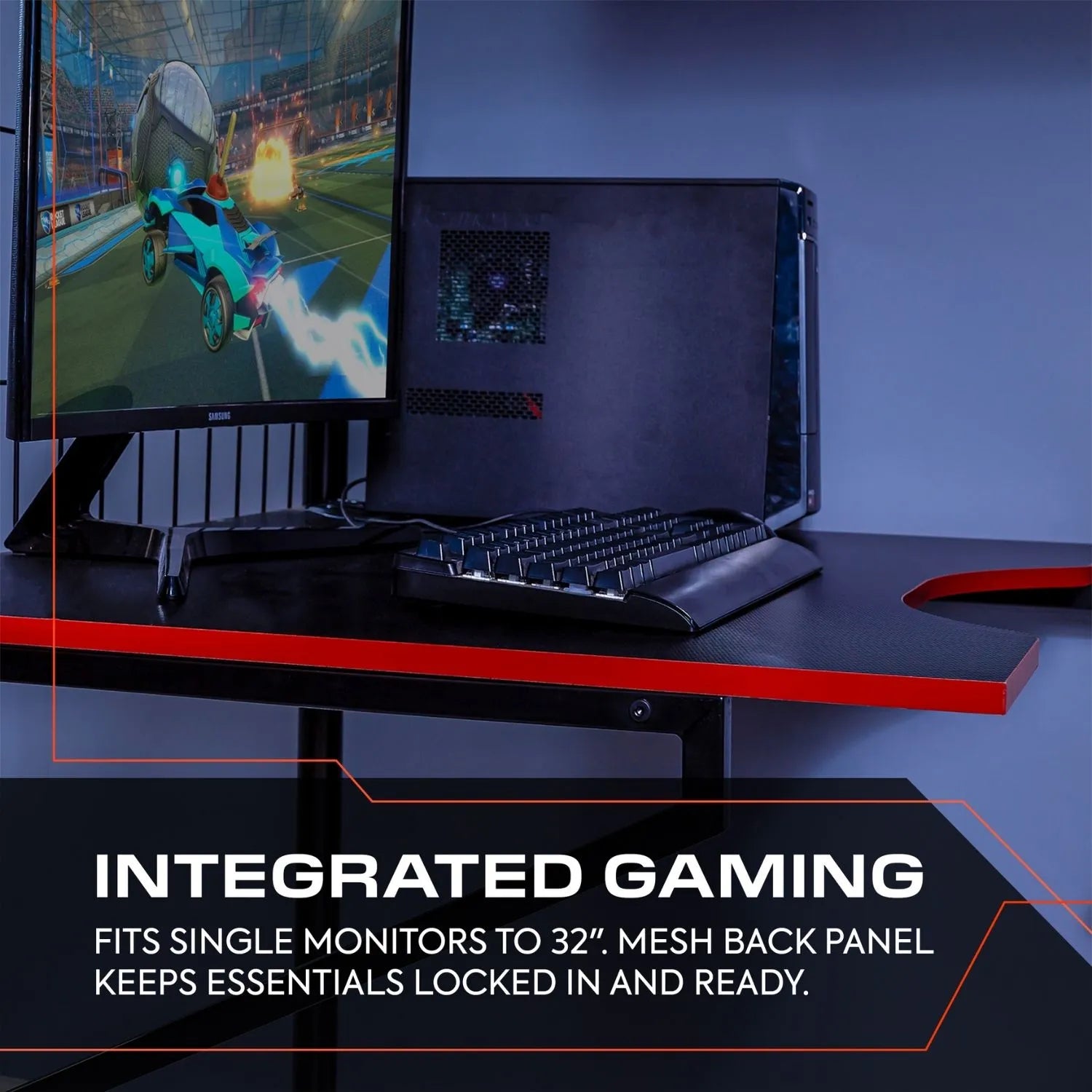 Gaming setup with monitor, keyboard, and desk on a dark background