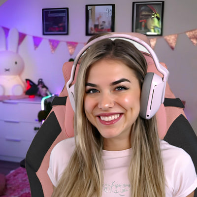 Woman wearing a gaming headset in a room with colorful decor