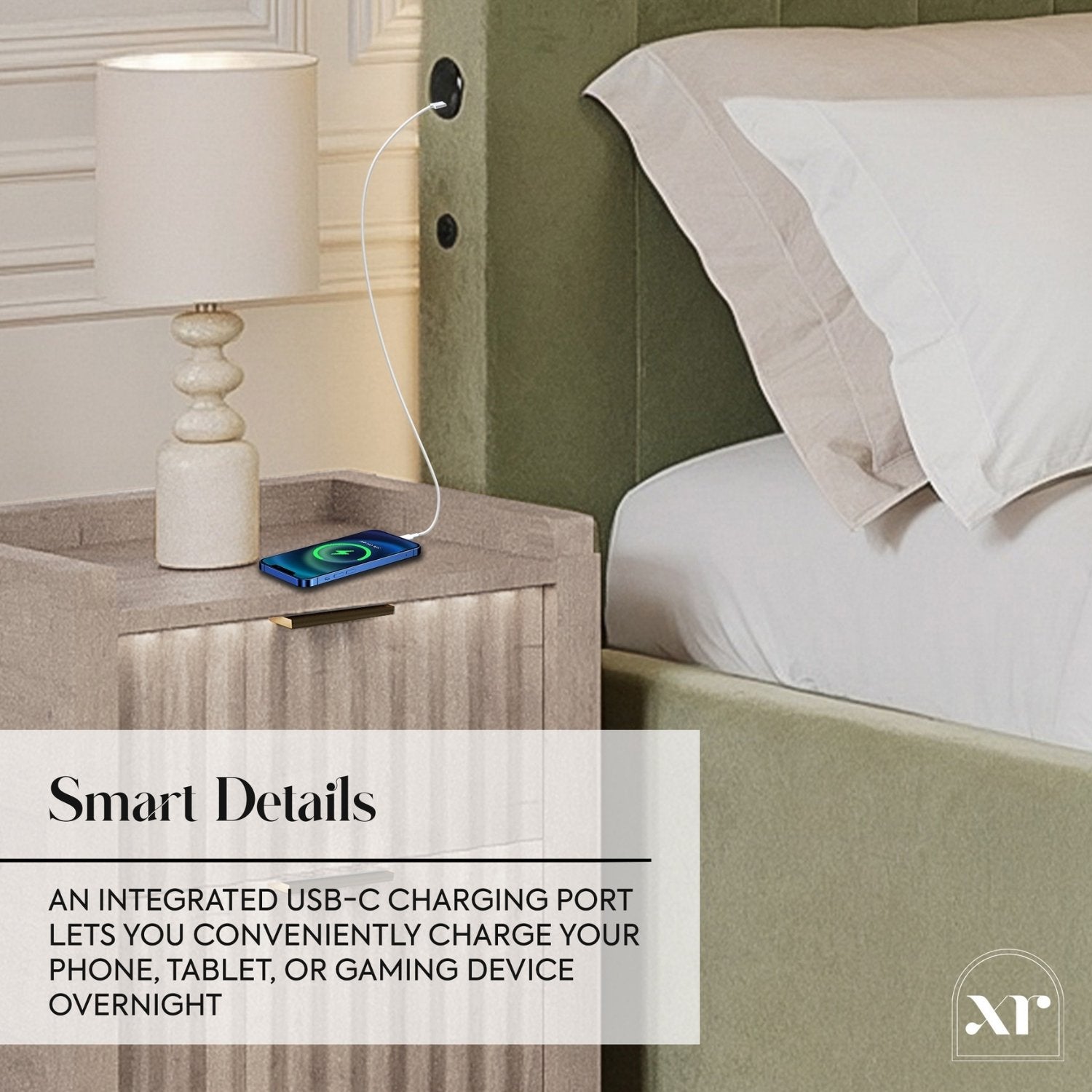 Bedside table with integrated USB-C charging port, lamp, and bed in background.