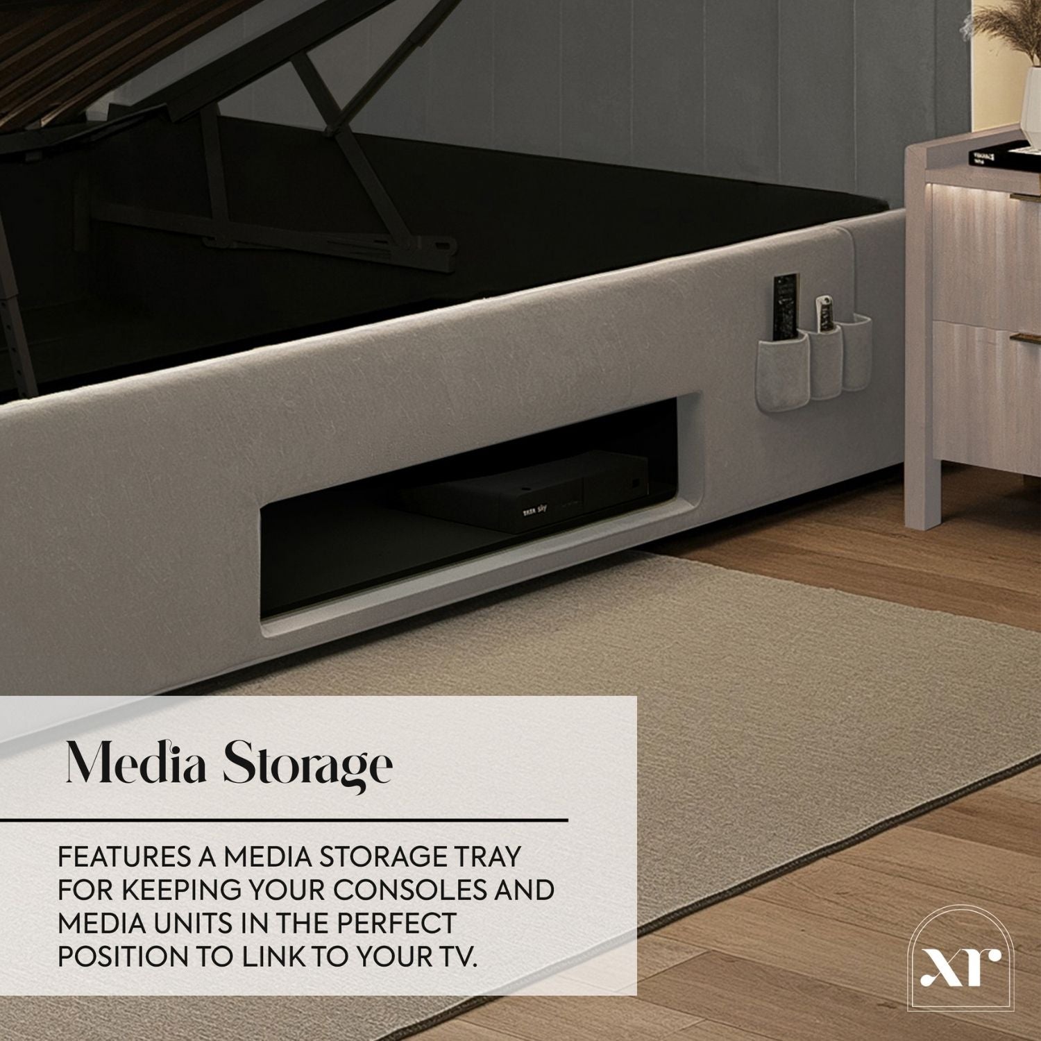 Media console with storage tray in a room setting, featuring text about media storage.