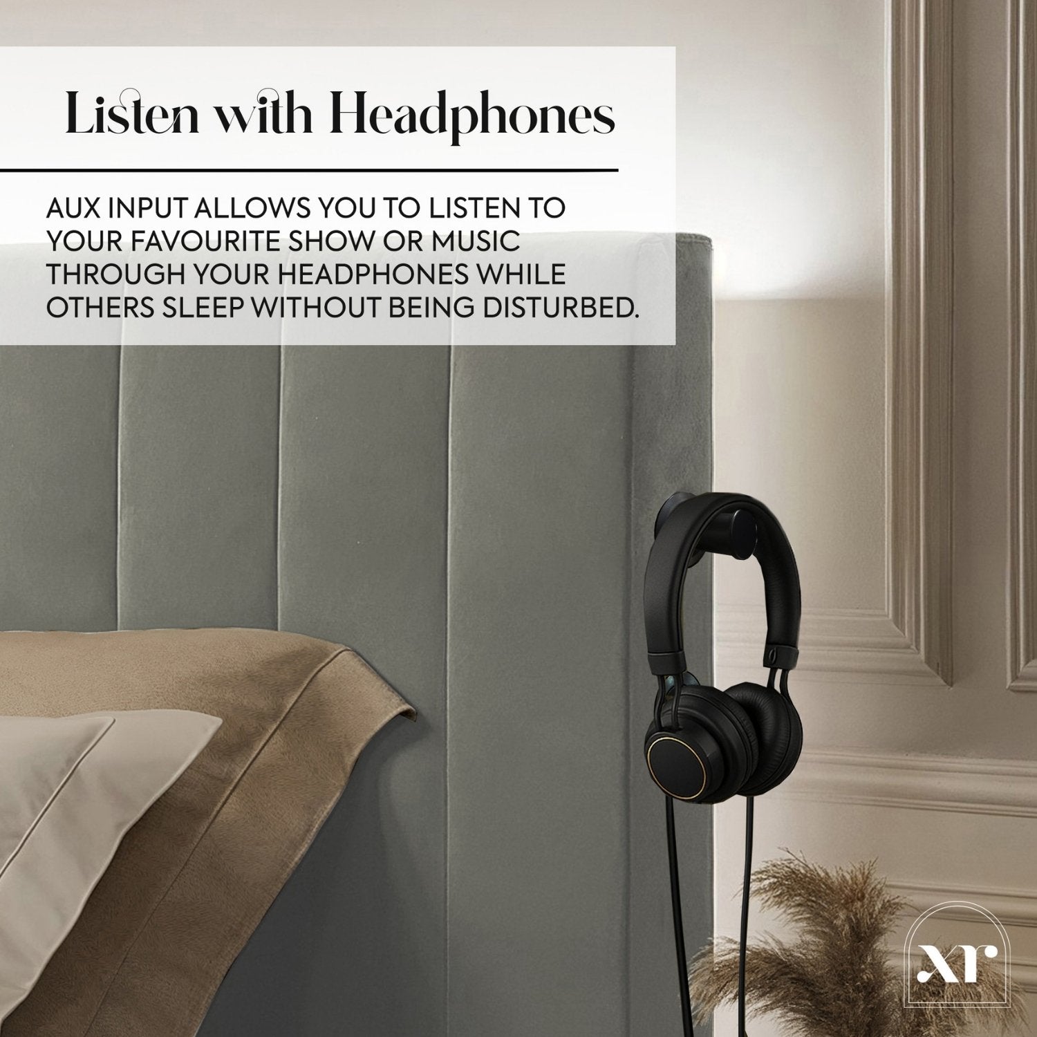 Headphones hanging on a headboard with text about headphone use.
