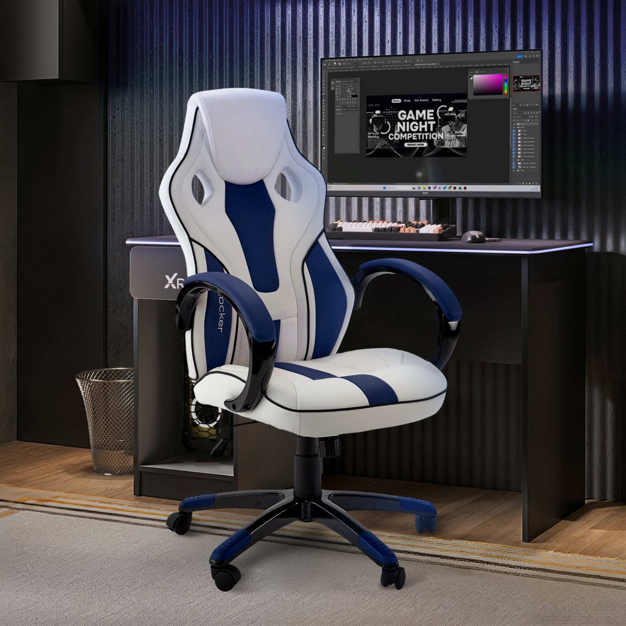 Gaming chair with blue and white accents in a room with a computer setup.