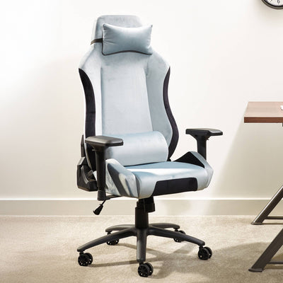 Gray and black office chair with headrest in a room setting.