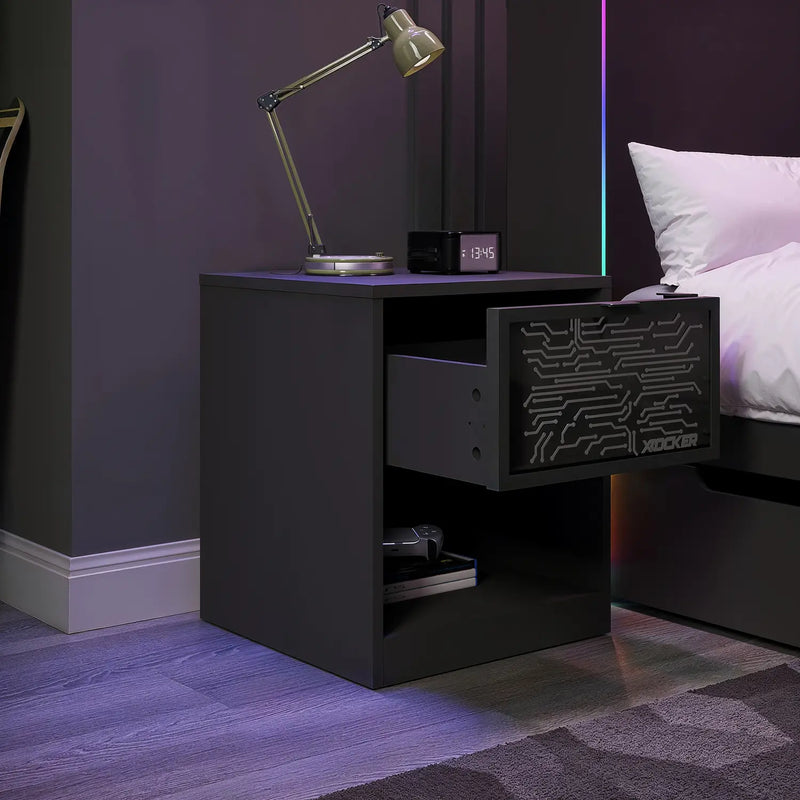 Black nightstand with open drawer in a bedroom setting