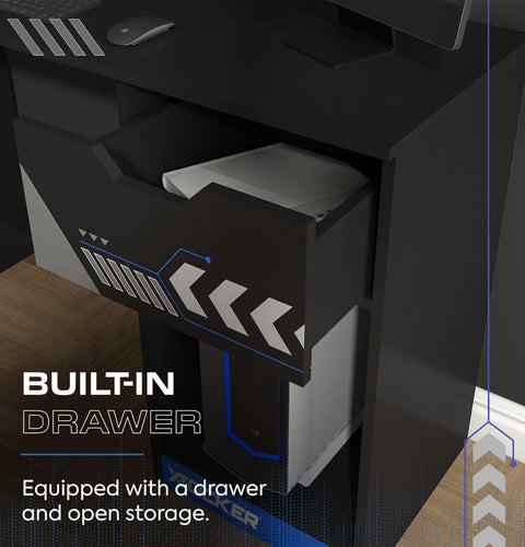 Black gaming desk with a built-in drawer and open storage space, featuring the brand 'X Rocker'.