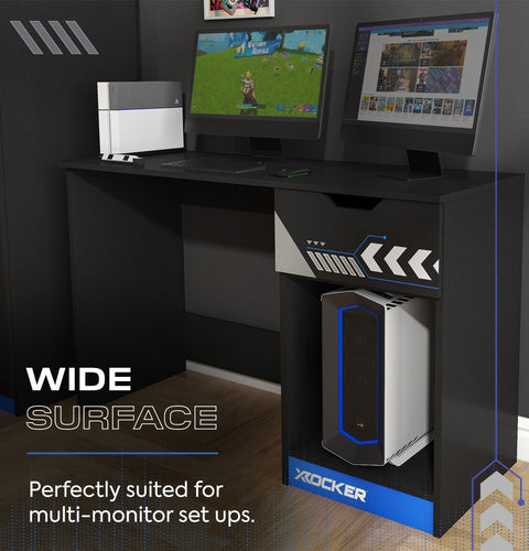 Gaming desk with two monitors and a computer tower, featuring X rocker branding.
