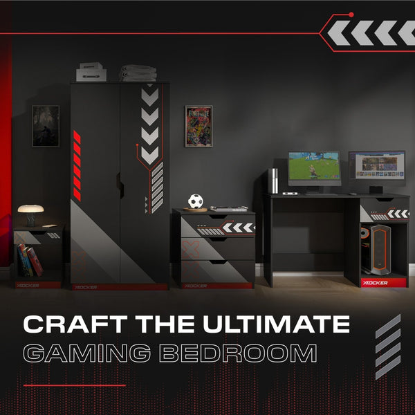 Gaming bedroom setup with desk, monitors, and shelves in a dark-themed room.