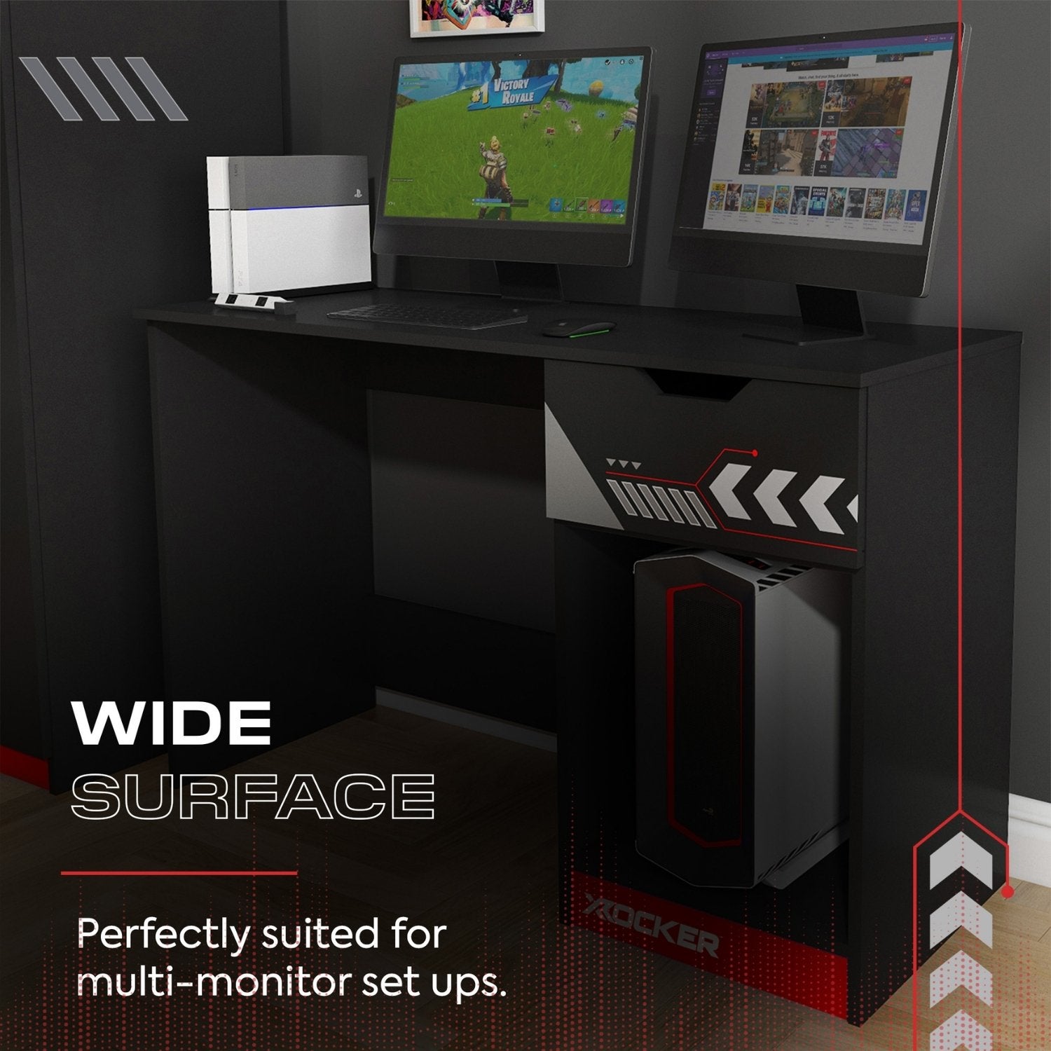 Gaming desk with multiple monitors and a computer tower, suitable for gaming setups.