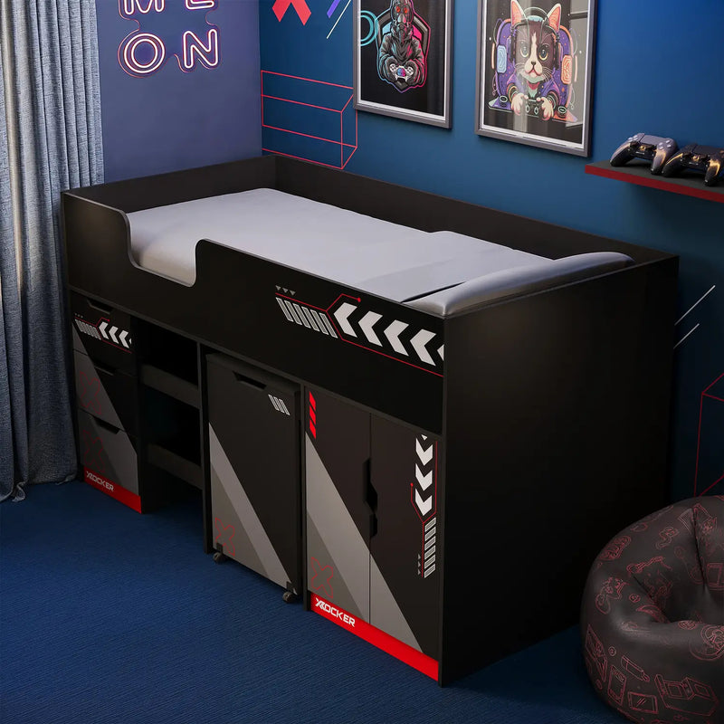 Octane Cabin Bed with red accents in a room with blue walls and framed artwork.