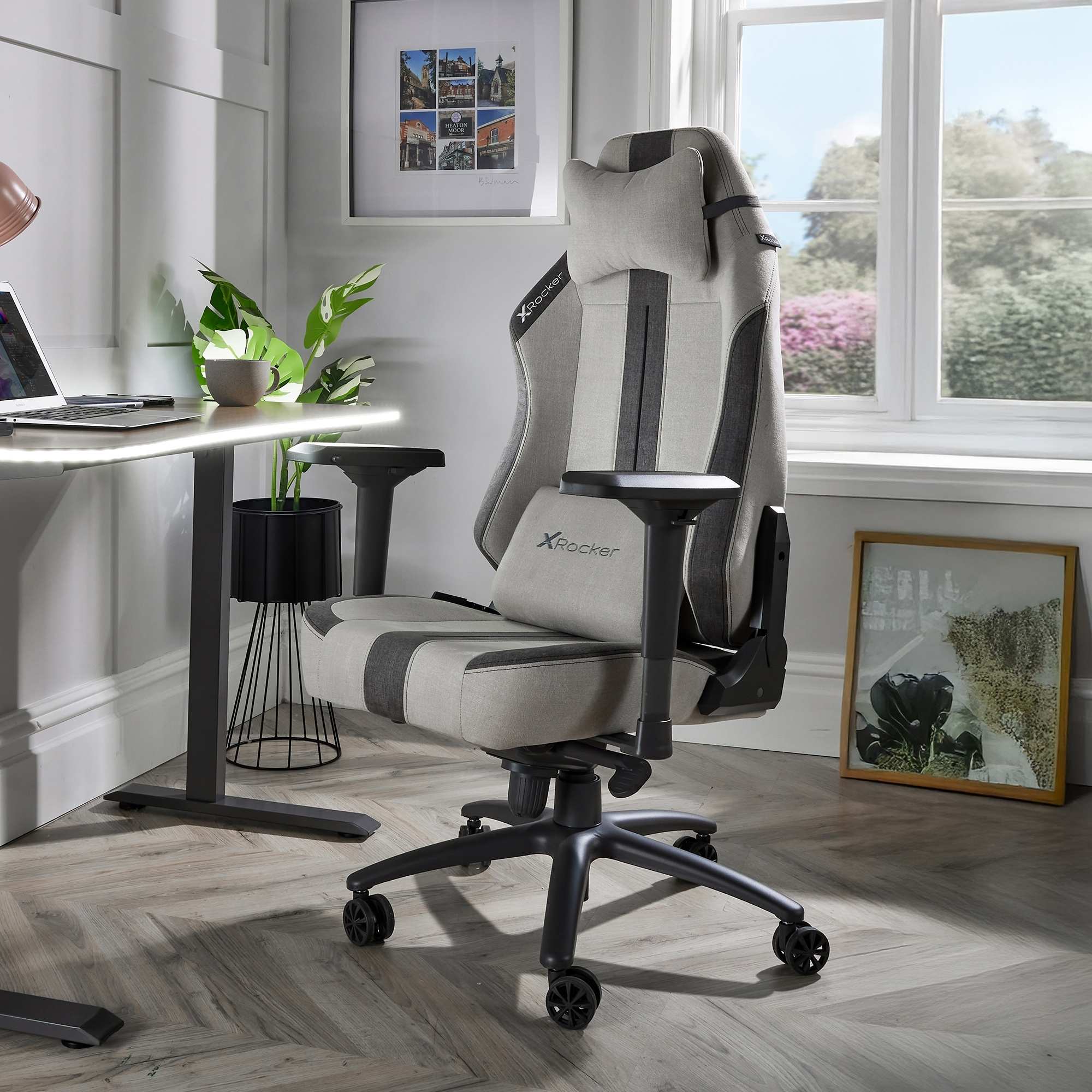 Ergonomic office chair in a home office setting with a desk and decor.
