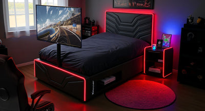 Modern bedroom with a bed featuring neon lighting, TV, and gaming setup.