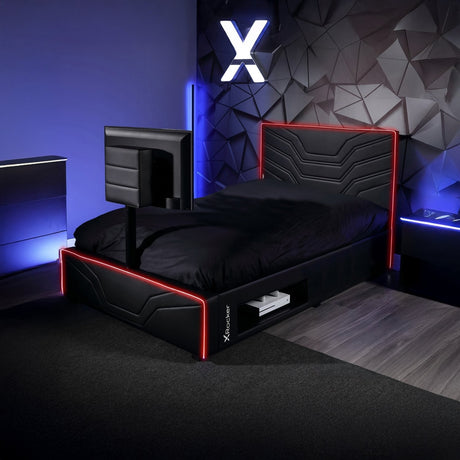 Black gaming bed with red accents in a dark room with geometric wall design