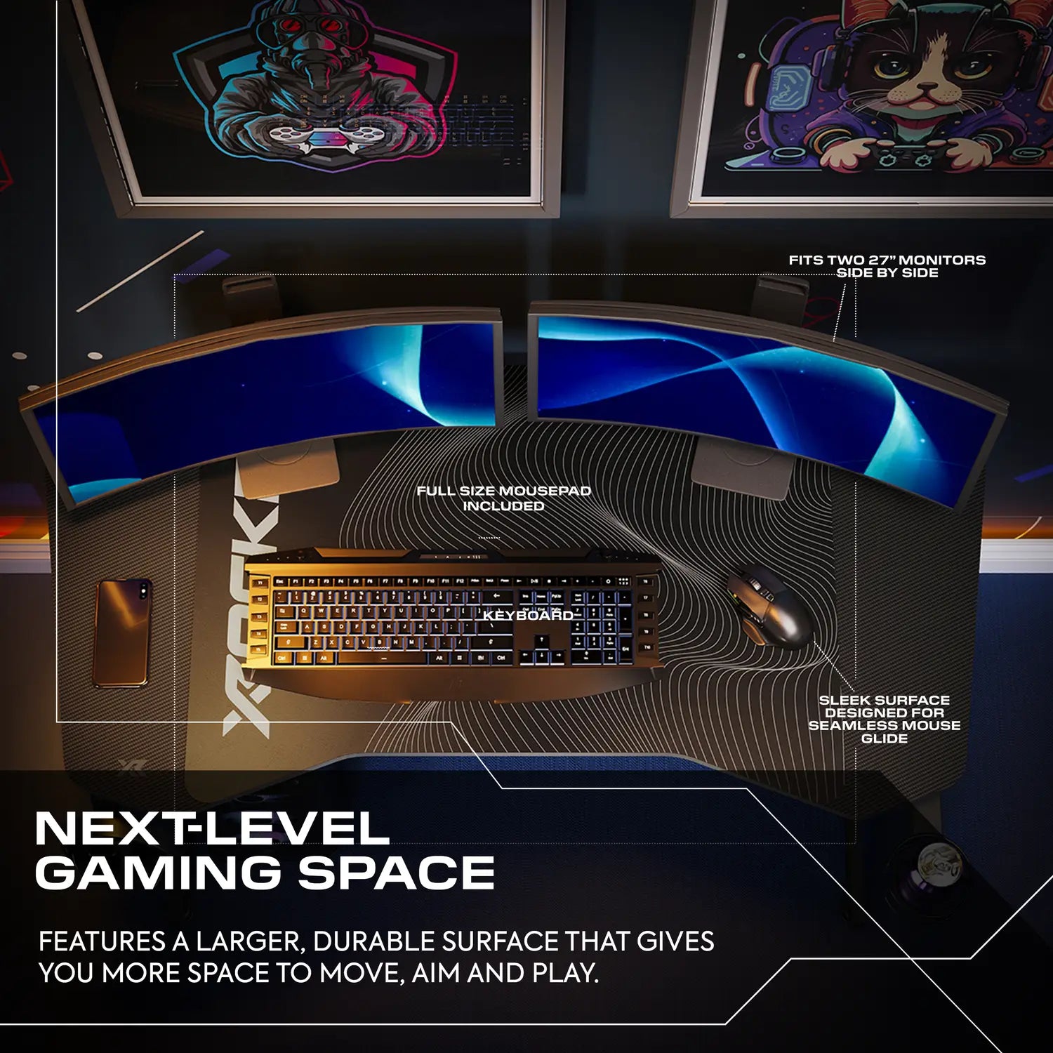 Gaming desk with dual monitor setup and keyboard, featuring text about next-level gaming space.