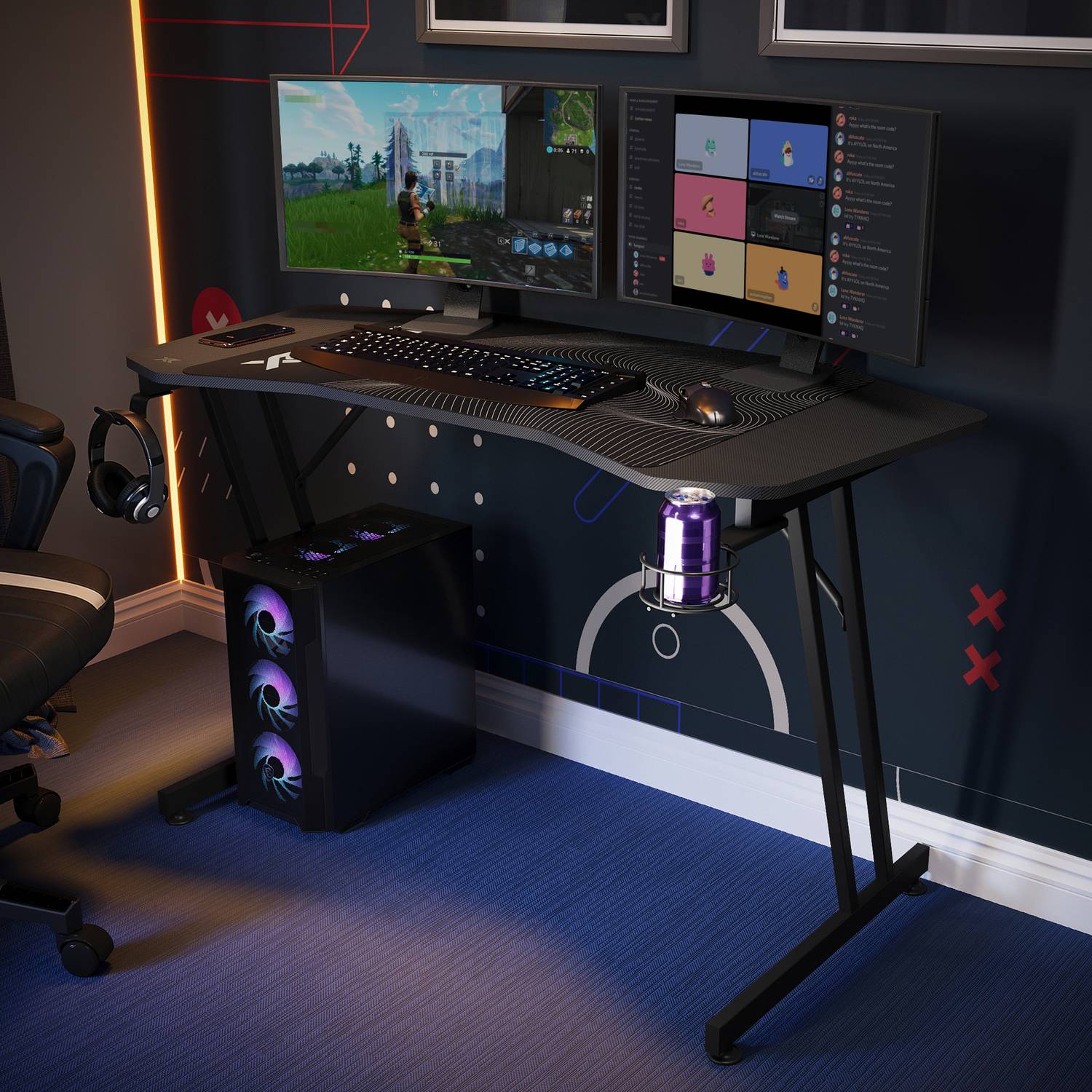 Panther Gaming Desk setup with dual monitors in a dark room