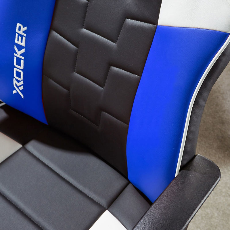 Close-up of a gaming chair with black, blue, and gray design, featuring the X rocker brand.