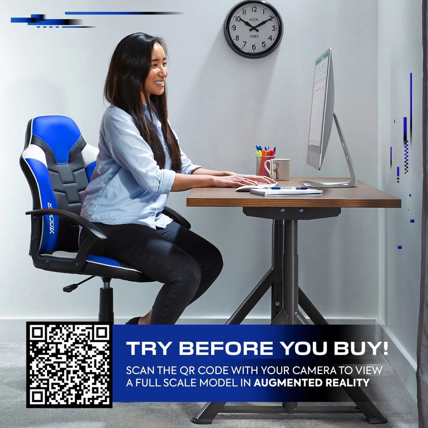 Woman sitting at a desk with a computer, surrounded by office supplies, with a QR code for augmented reality on the screen.