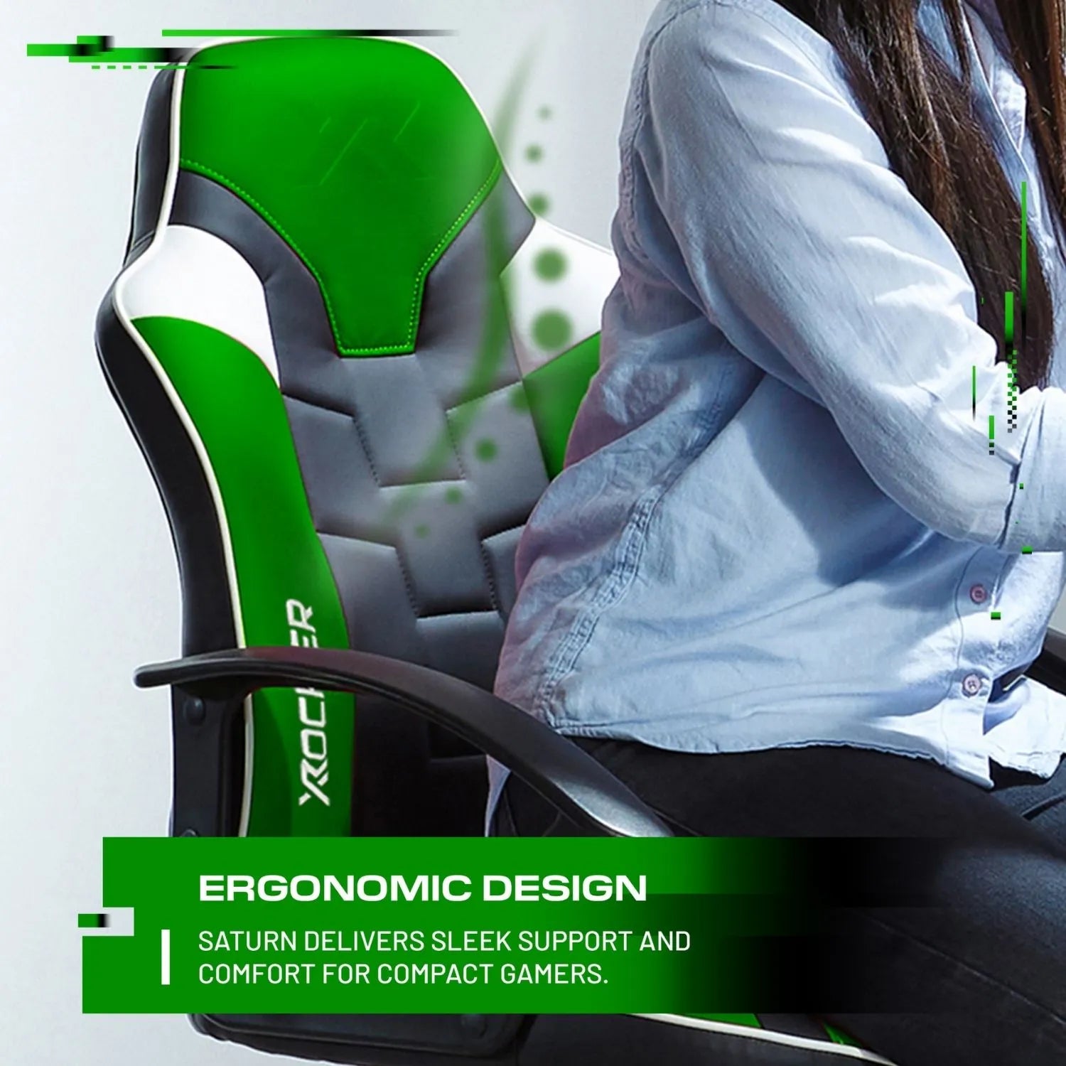 Ergonomic gaming chair with a person sitting on it, highlighting its design and comfort.