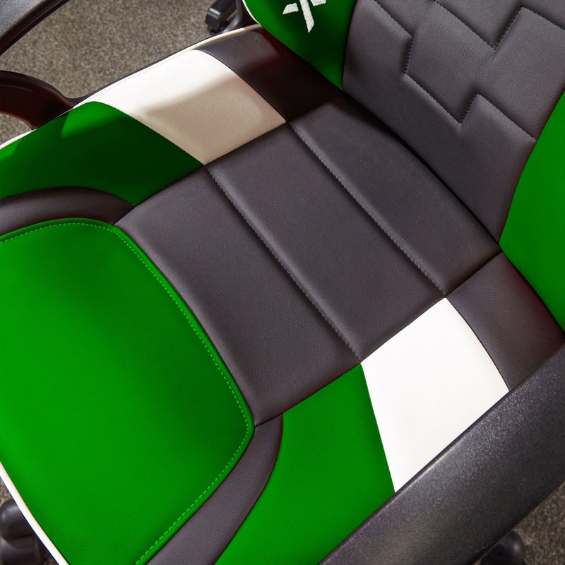 Close-up of a green and gray gaming chair with a X Rocker brand logo.