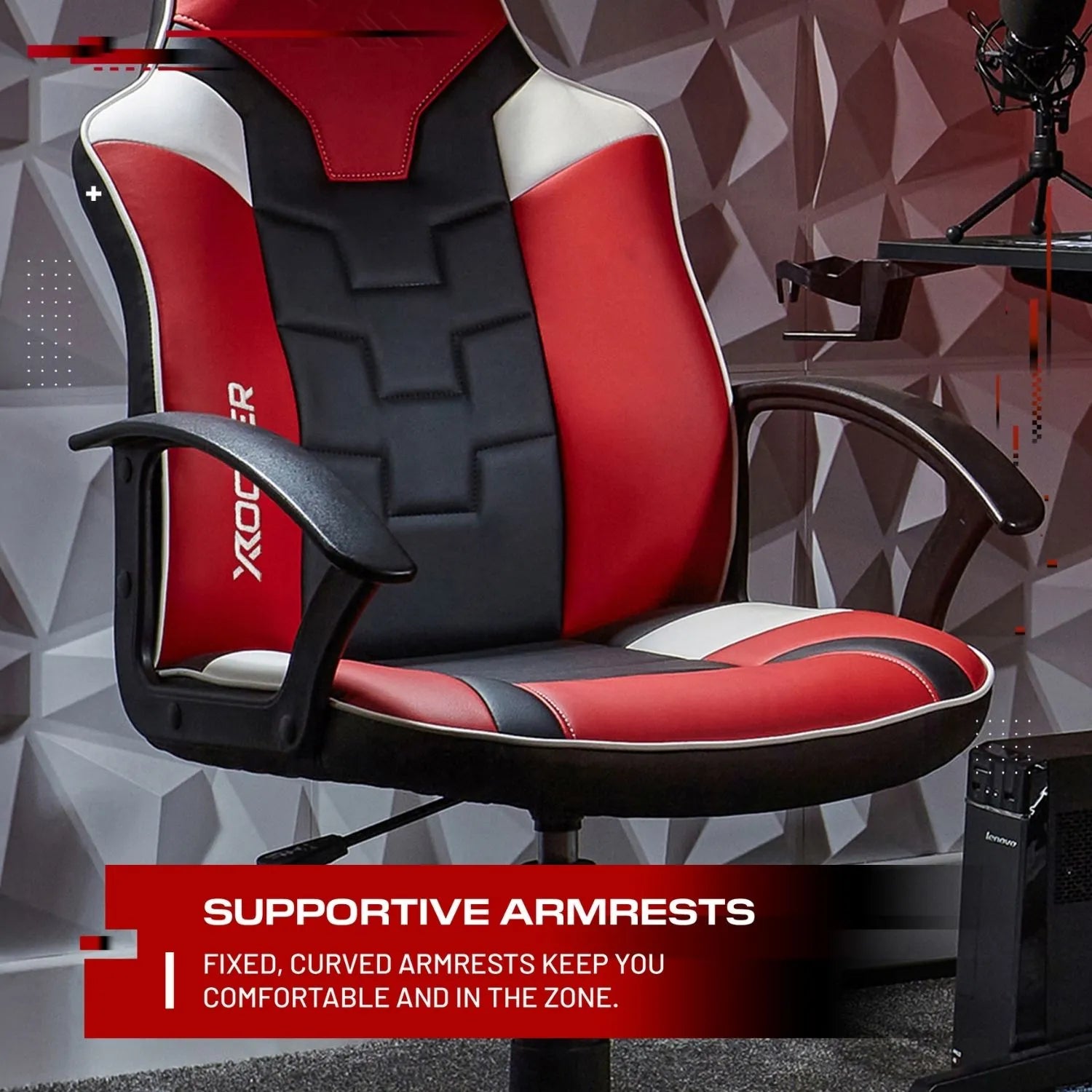 Red and black gaming chair with supportive armrests on a geometric patterned background