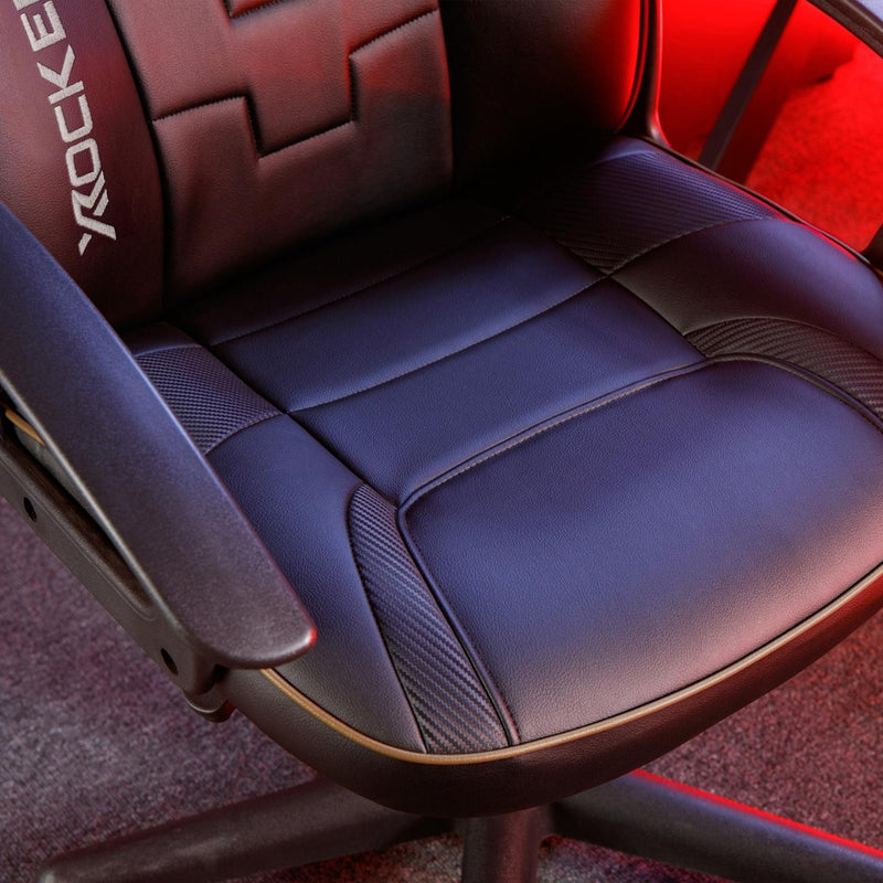 Gaming chair with 'X-ROCKER' branding on a red background
