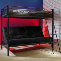 Black metal bunk bed with futon seats against a colorful wall.
