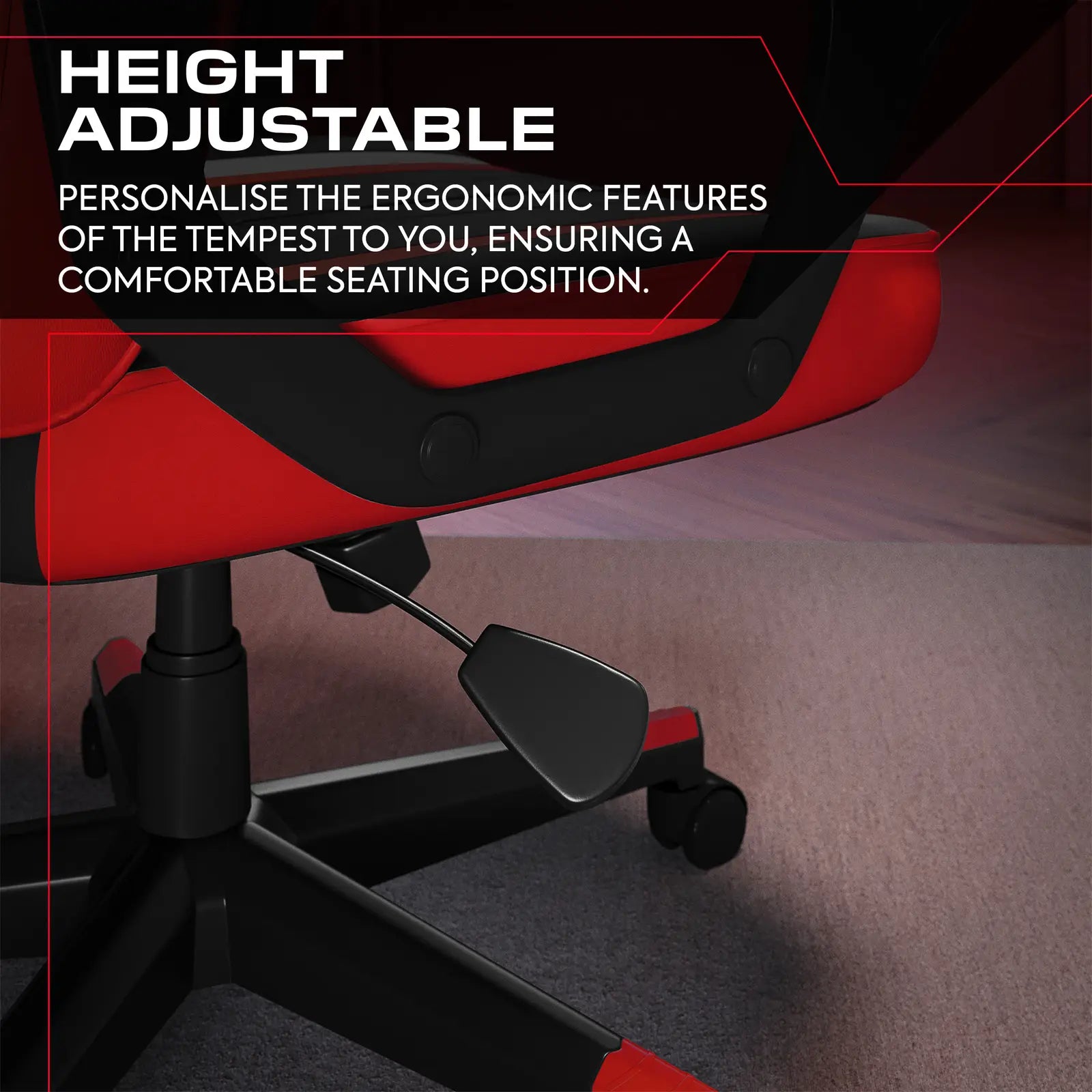 Red and black office chair with height adjustable feature on a dark background