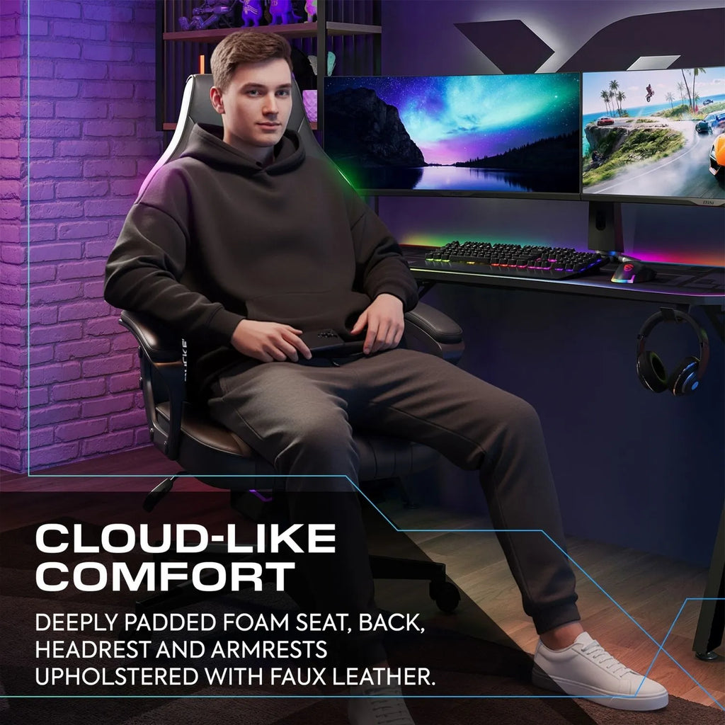 Person sitting in a gaming chair with a setup featuring multiple monitors and gaming equipment.