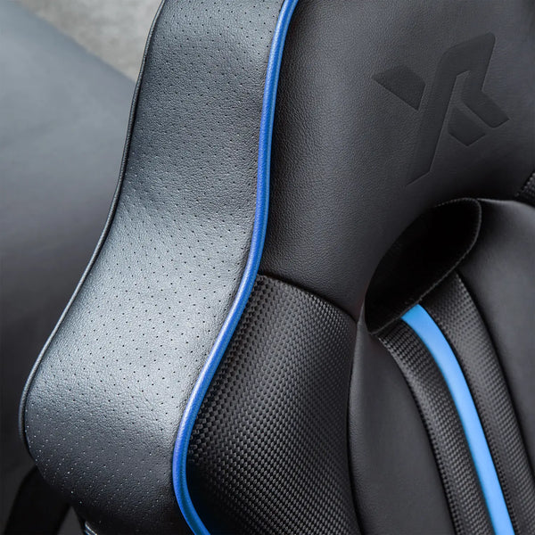 Close-up of a gaming chair with blue stitching and a brand logo.