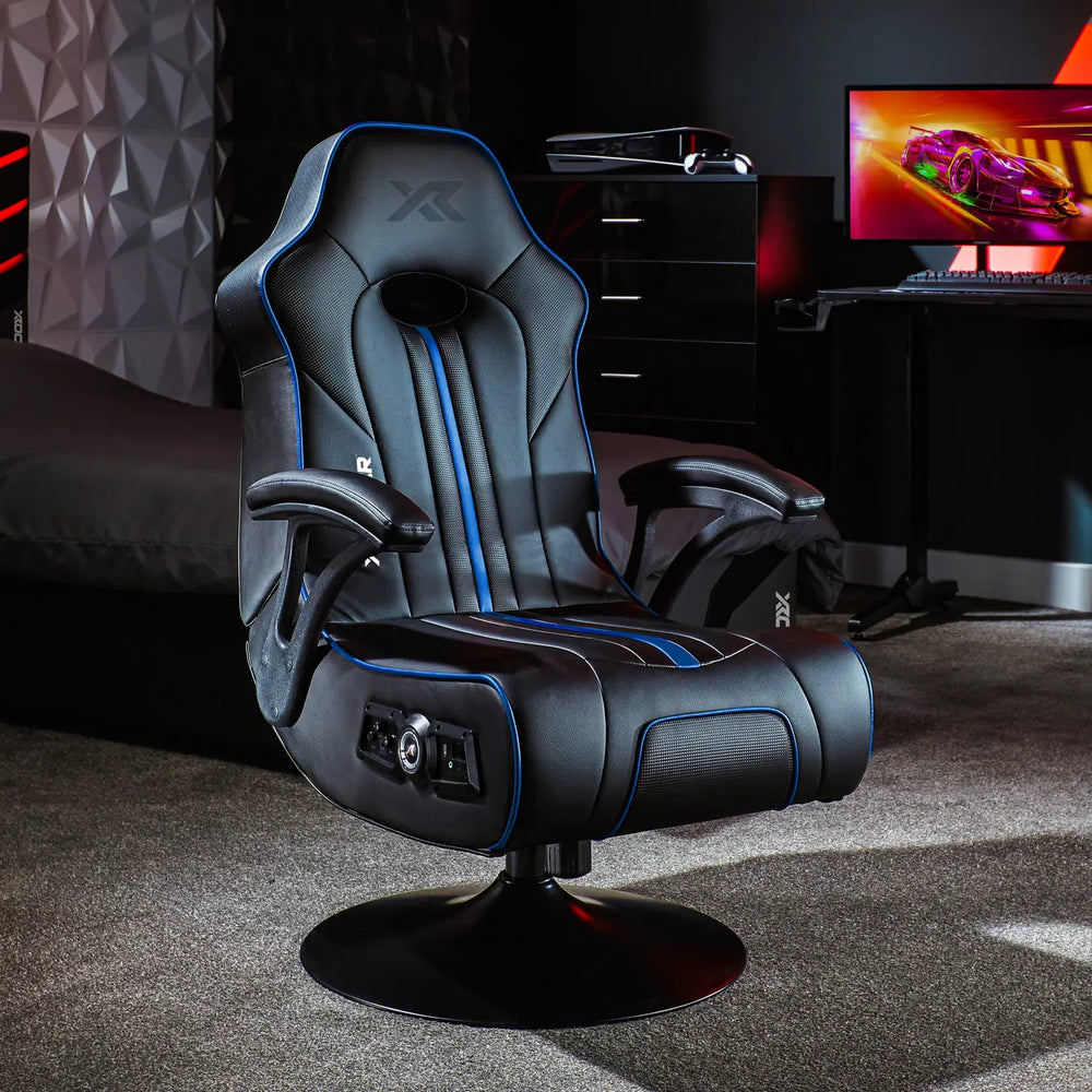 Gaming chair with blue accents in a room with a computer setup.