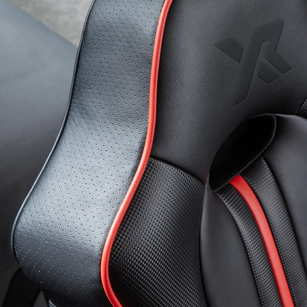 Close-up of a Torque gaming chair with red stitching and a XROCKER brand logo.